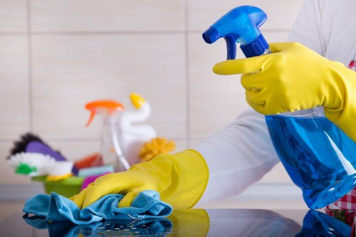 Cleaner preparing a Pimlico Airbnb flat for guest arrival