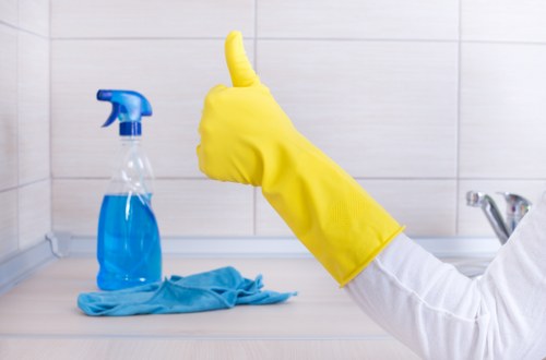Commercial cleaners maintaining a Pimlico office kitchen and shared space
